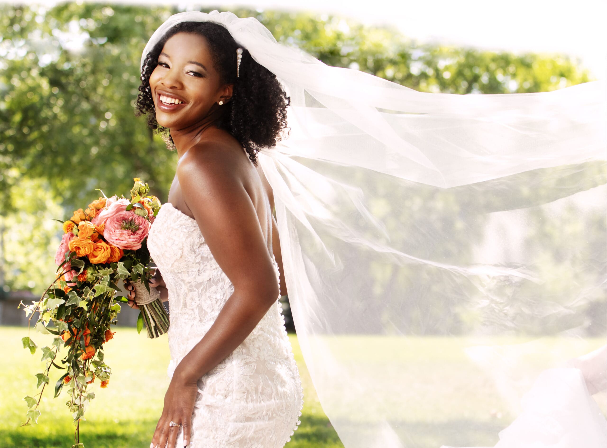 Bride in Cathedral Veil Outdoors Bride in Long Veil Holding Bouquet Outdoors